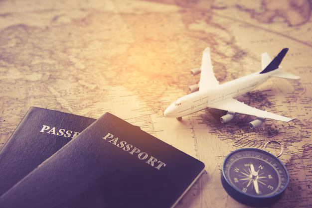 passeport-avion-boussole-place-carte-concept-voyage